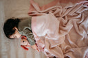 DLUX Pixie knitted cotton baby blanket, styled product photograph