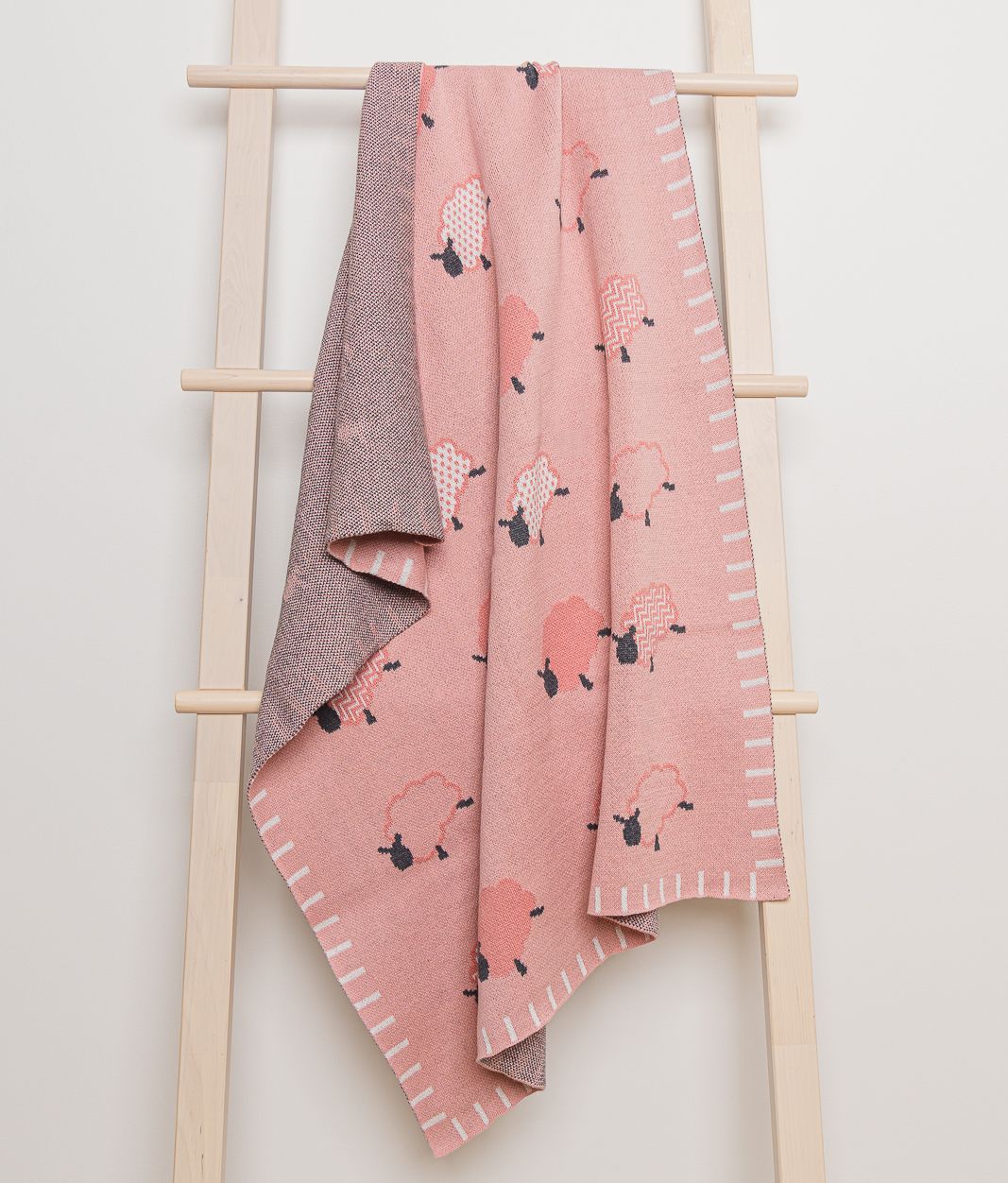 DLUX knitted baby textile collection example